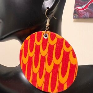 Large, bold statement earrings